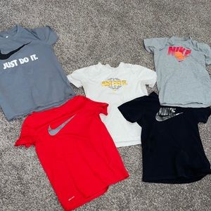 Lot of Nike tshirts.